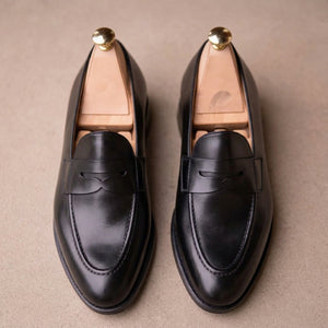 BLACK LEATHER PENNY LOAFERS