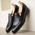 BLACK LEATHER PENNY LOAFERS